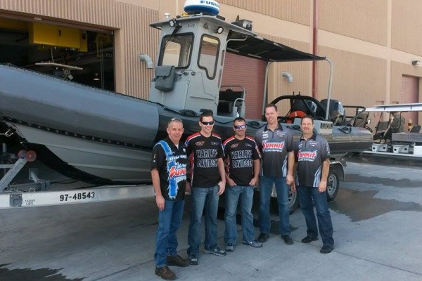 nhra drivers near military zodiac boat