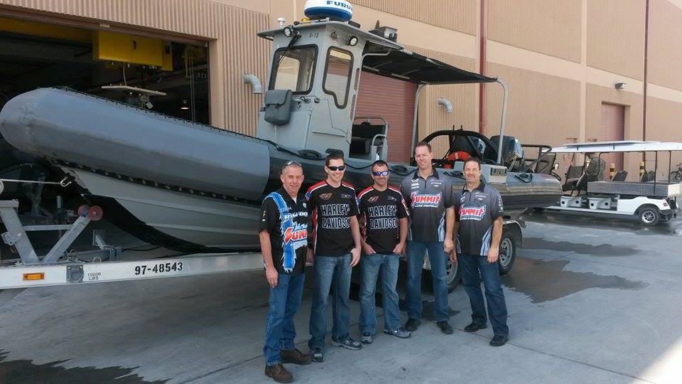 nhra drivers near military zodiac boat