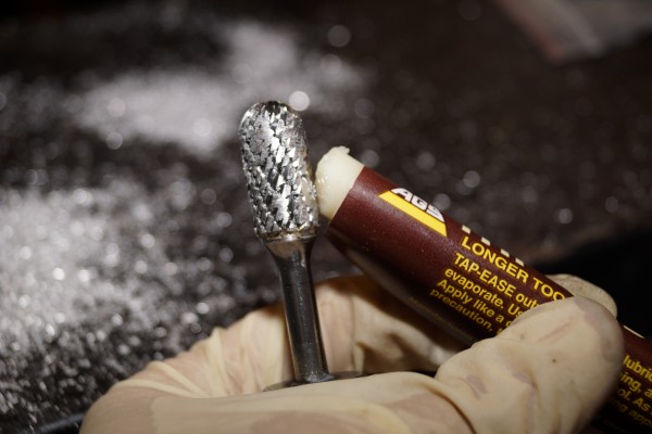 applying grinding compound to a grinding tip