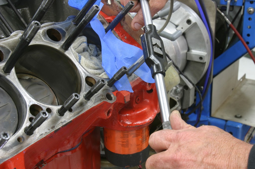 using a tap and die set to make threads in an engine block