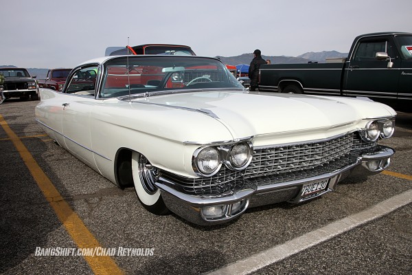 white lowrider 1960s era cadillac hardtop coupe