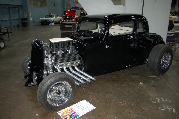 hemi powered black ford five window hot rod