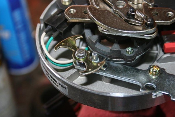 close up of vacuum advance mechanism on a distributor