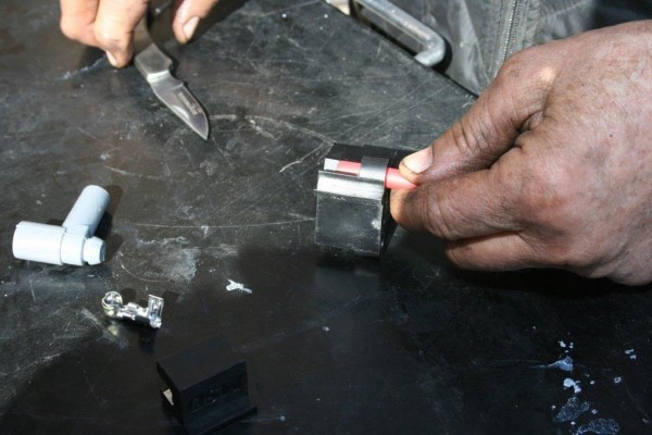 installing a spark plug terminal onto an ignition wire