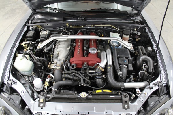 mazda miata engine bay with a 1.8L mazdaspeed motor