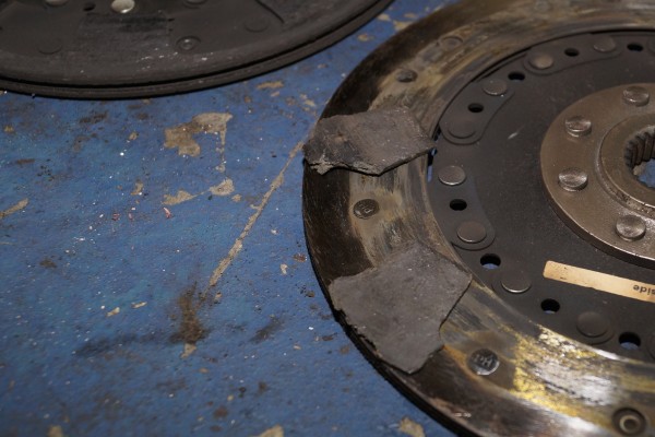 a broken bad clutch pulled from a ford mustang foxbody