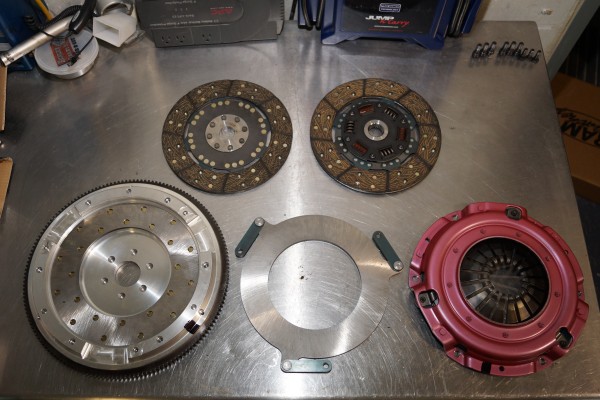 clutch disassembled on a workbench