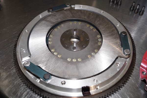mustang clutch resting on a workbench