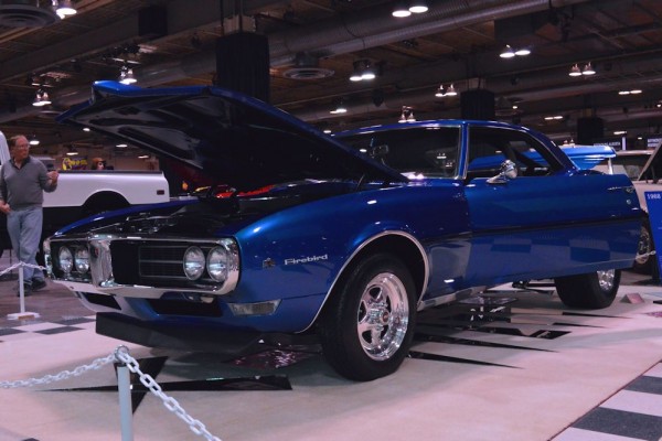 1968 pontiac firebird coupe at indoor car show