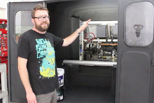 rutledge wood showing off inside of his delivery truck