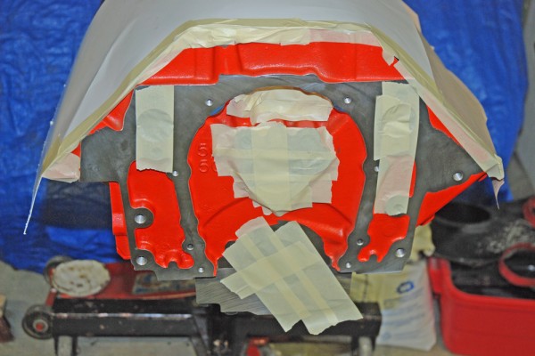 an engine block with passages taped off prior to grinding
