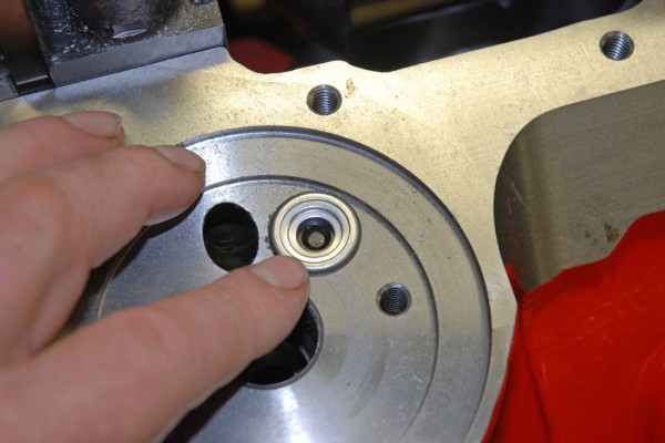 oil filter adapter port installed in an engine block
