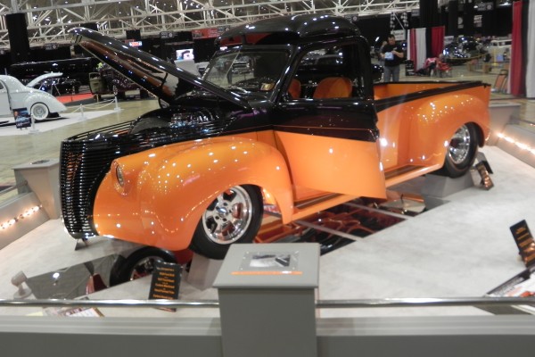 vintage pickup truck on display at a car show