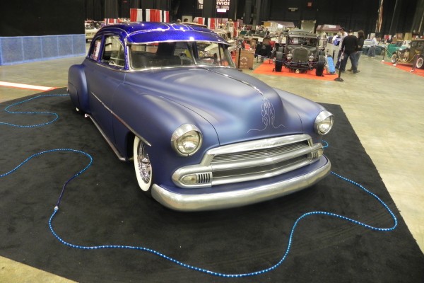 vintage postwar chevy coupe hot rod with lake pipes