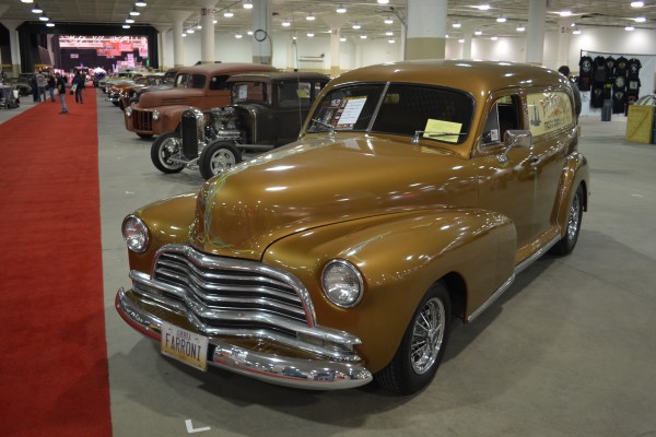 vintage panel wagon on display at indoor car show