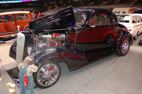 Classic hotrod with time out kid wearing a summit racing hat