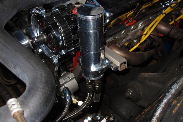 power steering reservoir mounting location