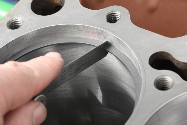 checking piston ring end gap with a feeler gauge