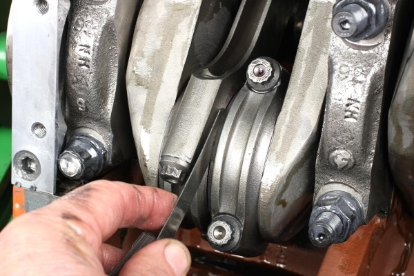 checking connecting rod clearance with a feeler gauge