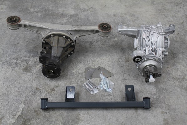 side by side comparison of a mazda and cadillac rear differential