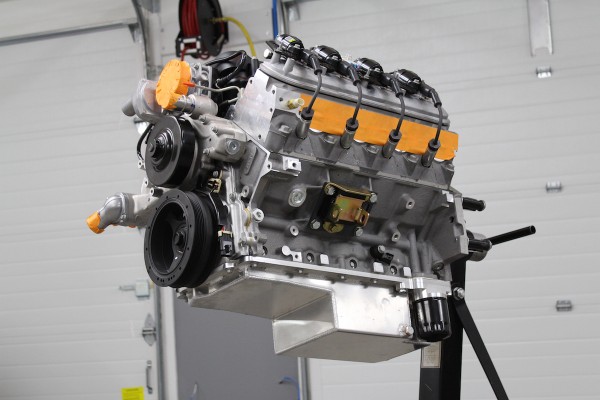 an ls engine on a stand for a miata swap