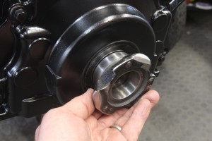This is our home made front timing cover seal alignment tool. We cut out the hub from a stock truck balancer and then honed the hub i.d. so it would slide over the crank snout. Leave the cover bolts loose and position the cover so the seal is centered on the hub. It’s that easy.