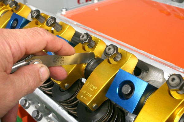 using a feeler gauge to adjust engine rocker arms