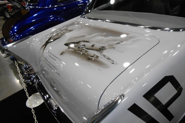 navy jet aircraft pilot mural painted on decklid of an old hotrod