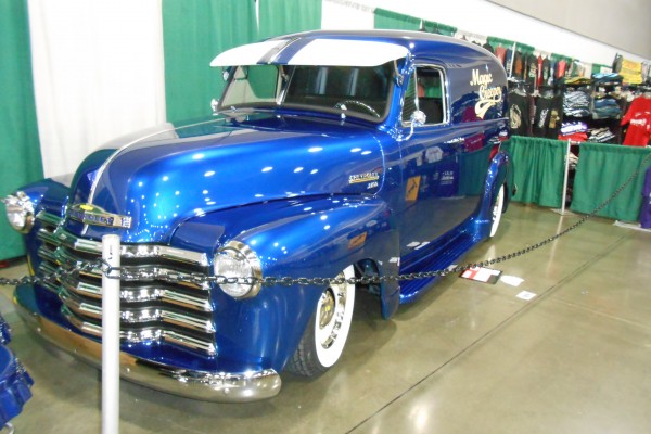 vintage chevy panel delivery truck at car show