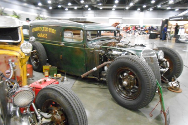 rad rod panel truck displayed at indoor car show