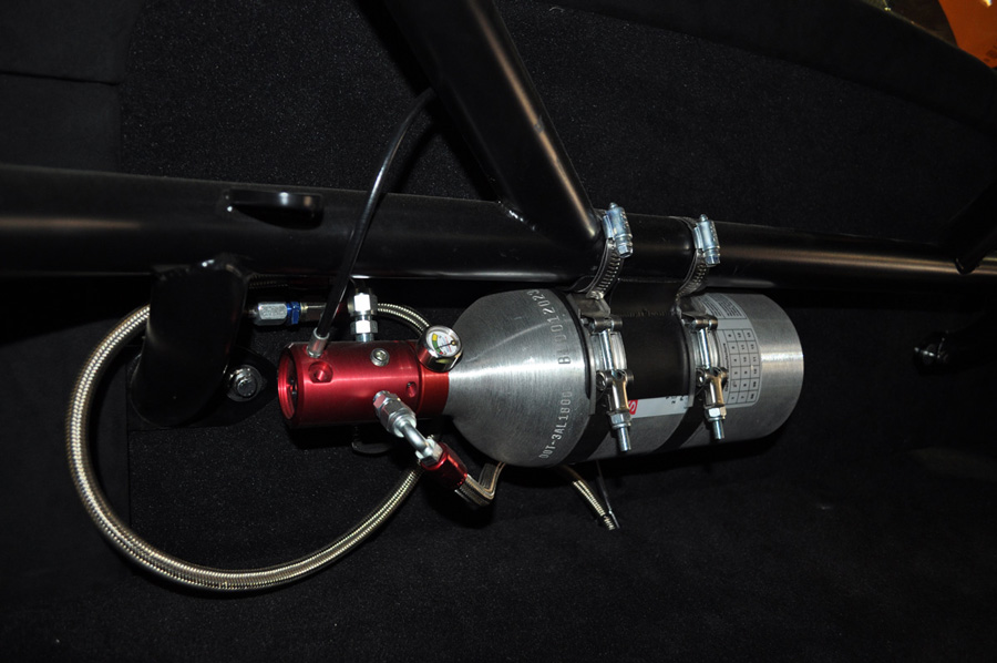 fire extinguisher bolted to a roll cage
