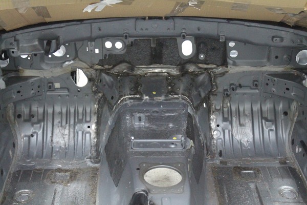 interior of a modified mazda miata prior to an LS swap