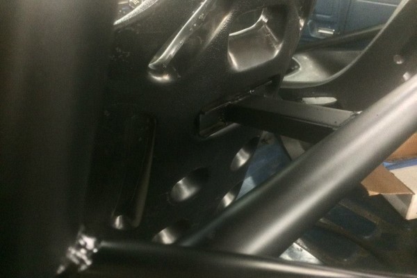 seat mounts inside a ford bronco race truck