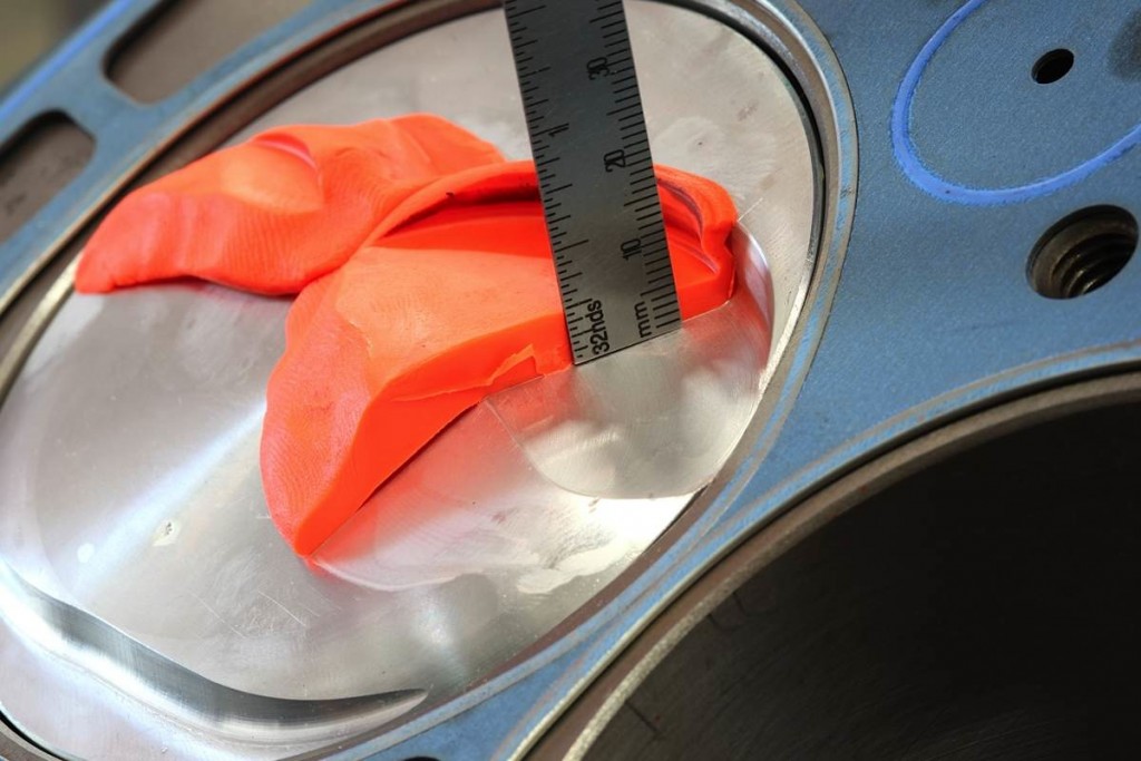 measuring valve reliefs in a piston head