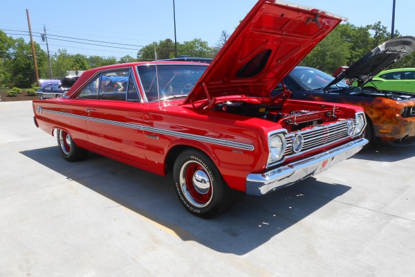 vintage plymouth muscle car at an all mopar show