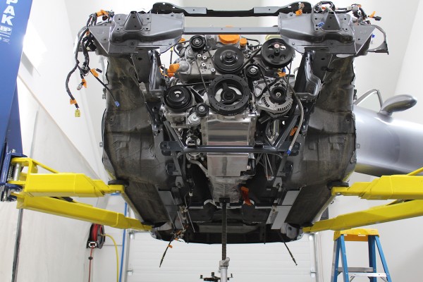 chevy ls engine in a mazda miata on a lift