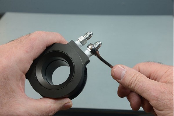 installing fittings into a hydraulic throwout bearing