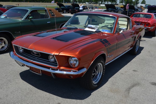 vintage orange ford mustang fastback