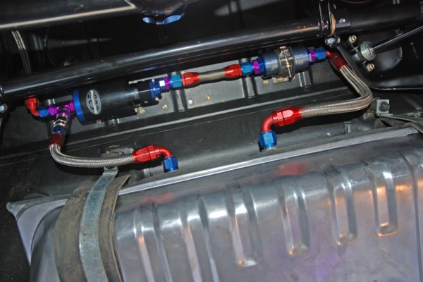 fuel pump plumbing and fittings in an old car