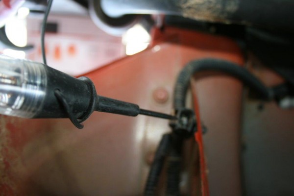 using a test probe on fog light wiring harness