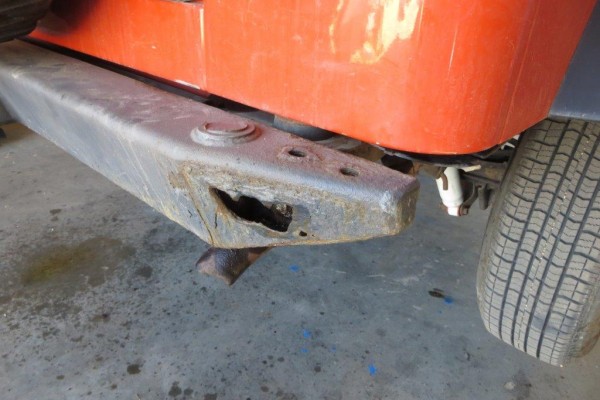 rusty warn bumper on the back of a jeep wrangler TJ
