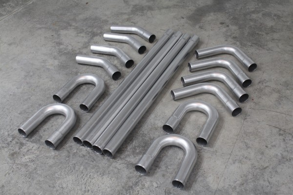summit racing rod builder exhaust kit on shop floor