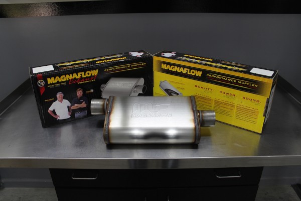 magnaflow muffler resting on workbench