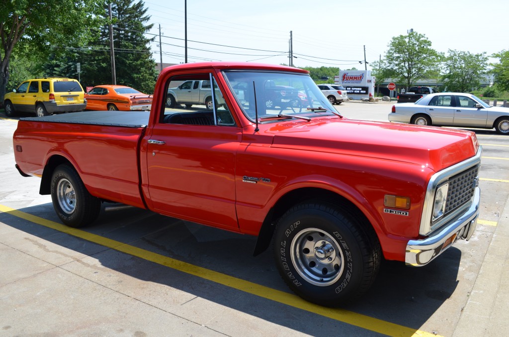 red 1971 chevy c-10 pickup truck, passenger side