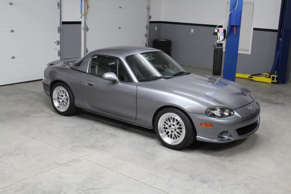 a mazda miata with a corvette ls engine under the hood