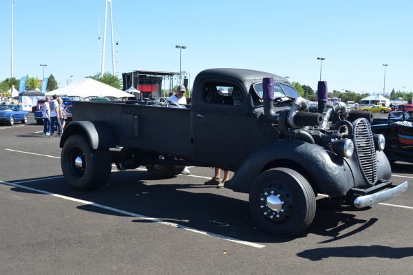 twin turbo rat rod truck at car show