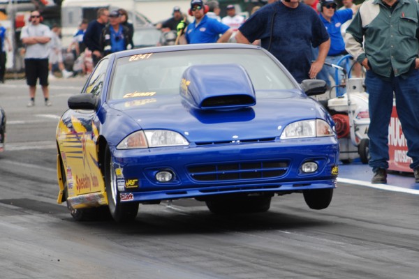 dragster style hood scoop on a chevy cavalier in nhra super modified class