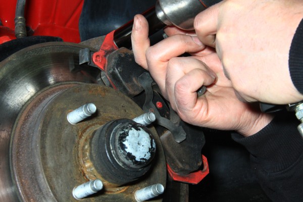 removing brake caliper on a ford mustang