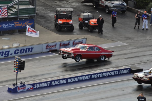 yenko sc tribute nova doing launch and wheelstand at dragstrip