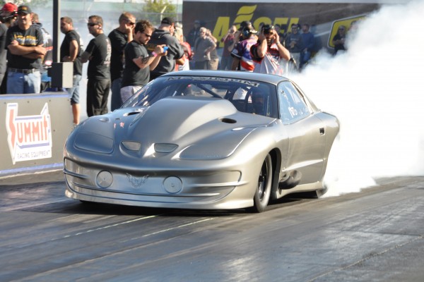 pontiac firebird trans am drag car doing a burnout